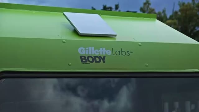 The Gillette Labs BODY decal along the lime green roof of the AdRover